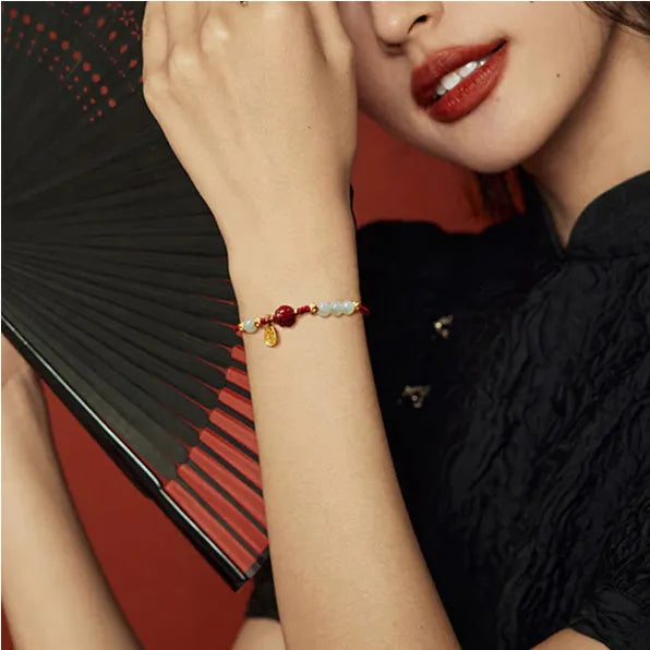 Women's Hetian jade cinnabar red rope bracelet with 925 silver charm and adjustable chain