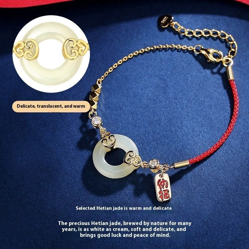 Hetian jade gourd bracelet set in 925 sterling silver with peace buckle and Fu character motifs on white background