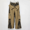 Women's dark khaki leopard print high waist jeans with tooling-style stitching detail