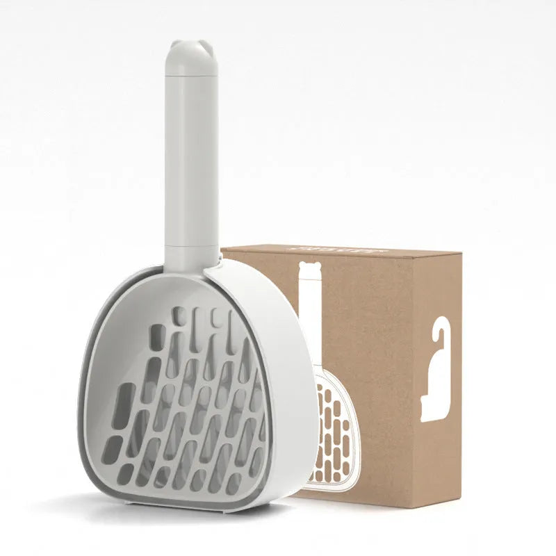 Plastic cat litter scoop with base in white model, showing hidden bag storage compartment and large scoop head with alternating apertures