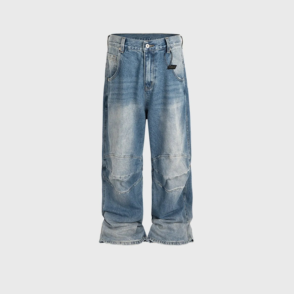 Profile Pleated baggy straight-leg washed white blue jeans on model