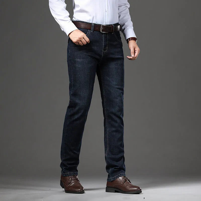 Man wearing black high-elasticity loose-fit straight-leg jeans, business casual style