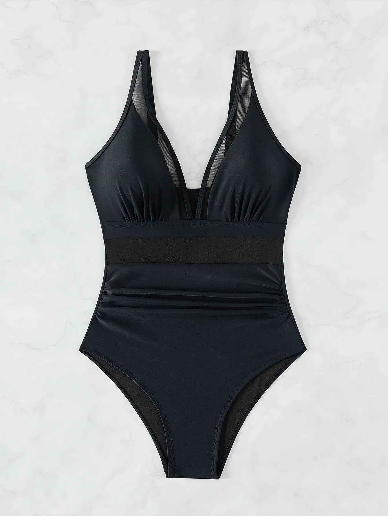 Black women's one-piece swimsuit with halter neck and mesh fabric panelling.