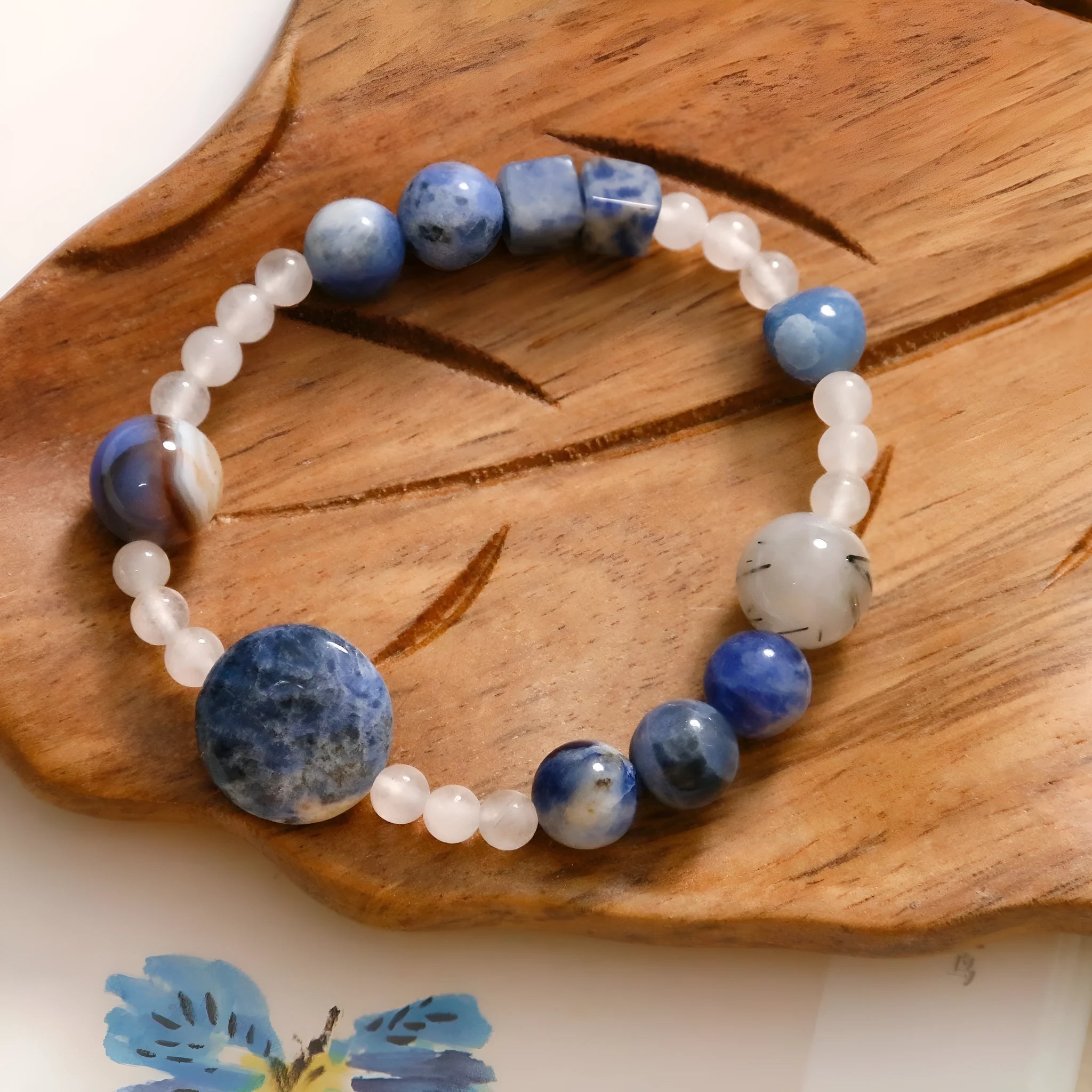 Natural blue point stone and black hair crystal agate hand-woven unisex bracelet with round and oval geometric beads