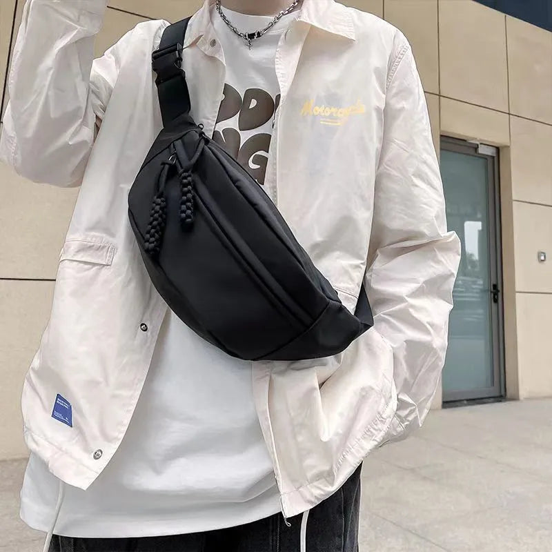 Men's small polyester crossbody chest bag in black nylon lining, 35cm width