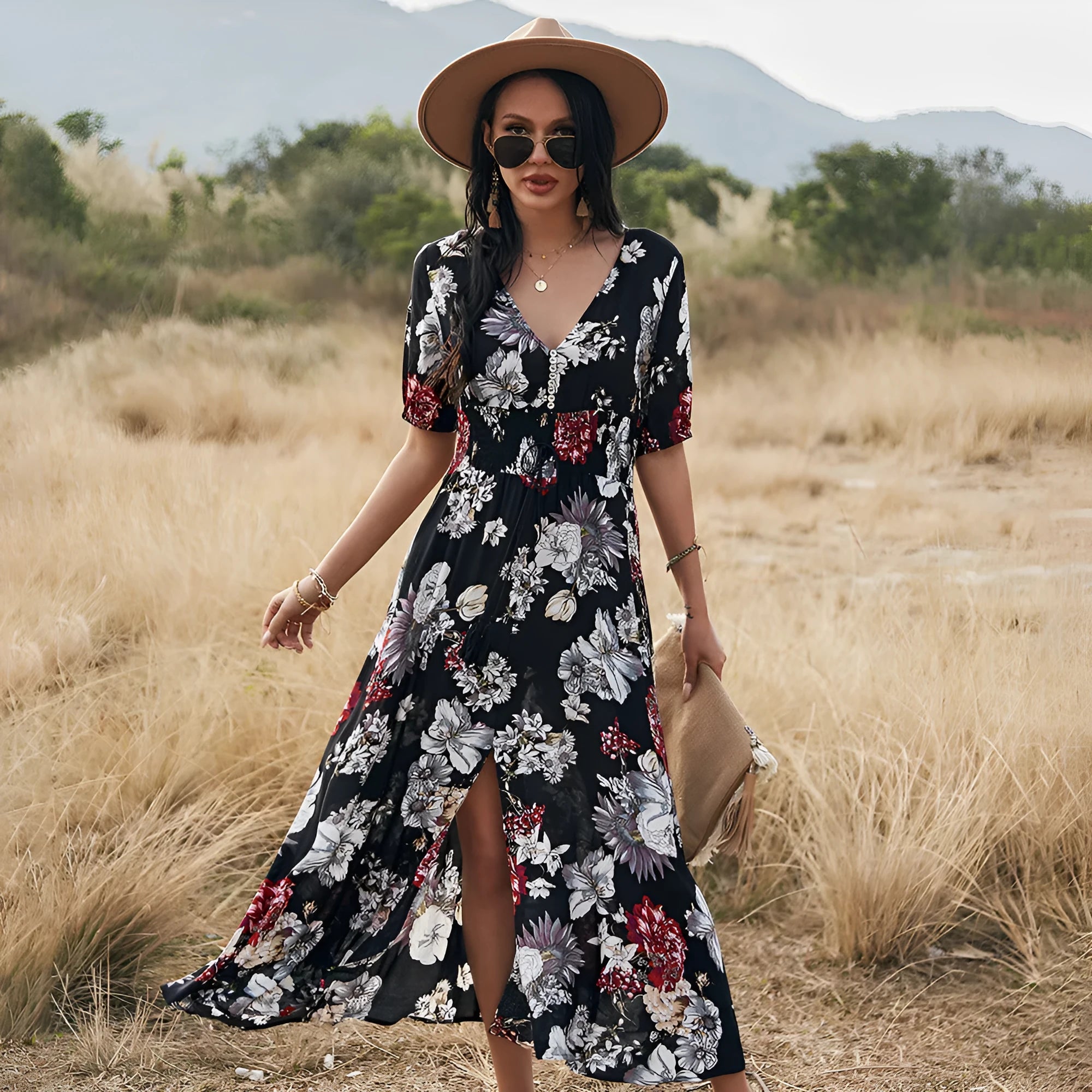 Yellow floral summer dress with V neck and elastic waist on mannequin