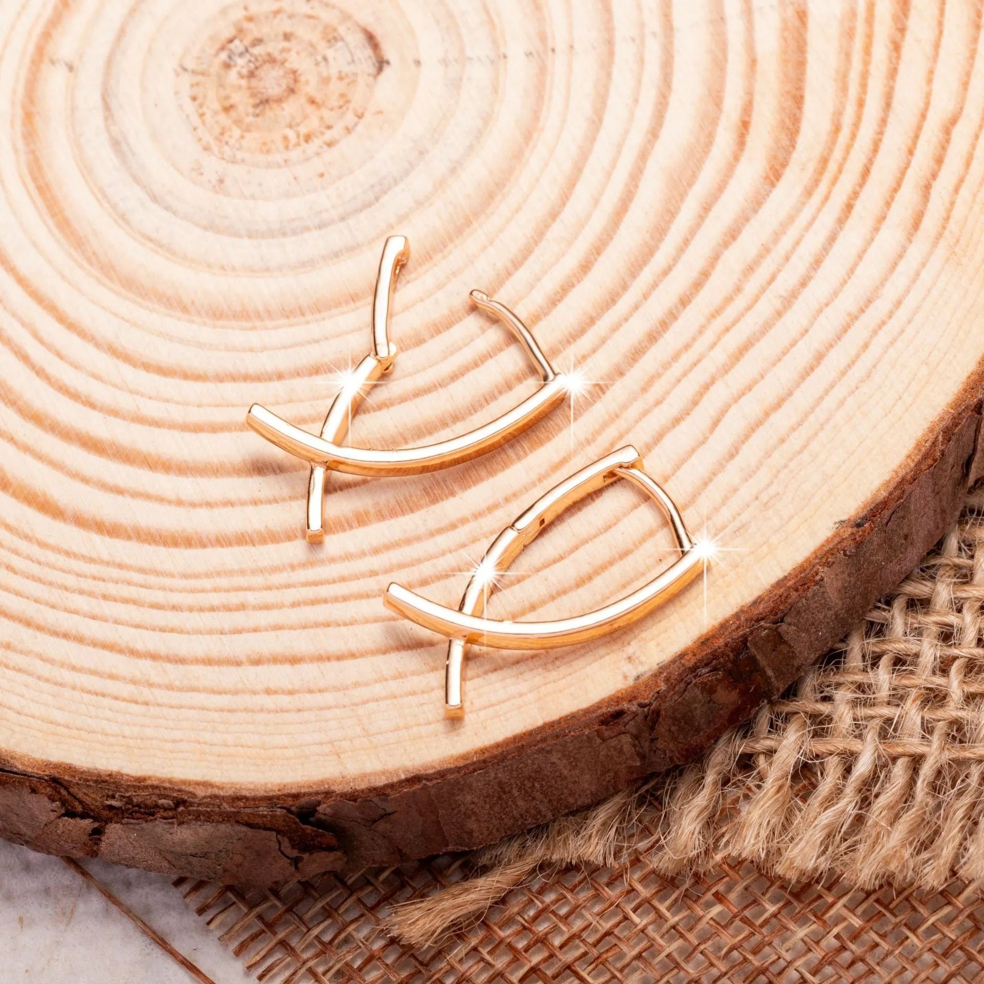 Rose gold plated copper cross earrings with symmetrical design and post fittings