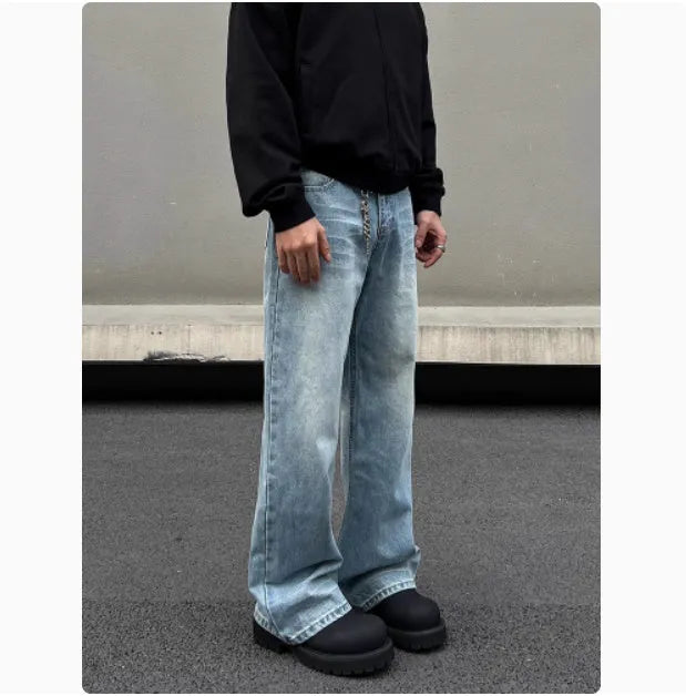 Men's retro whisker washed blue straight jeans with visible stitching and medium-high waist.