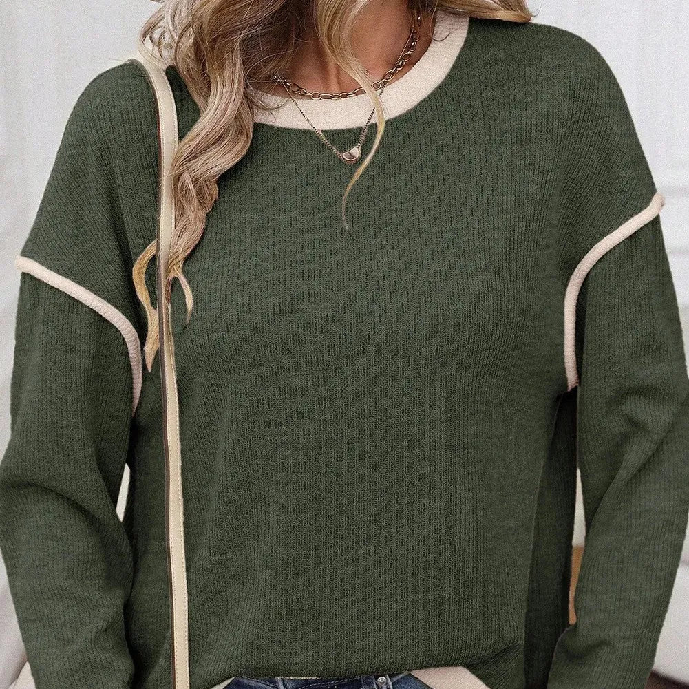 Drop shoulder loose knit top with four leaf clover pattern and contrast colour trim