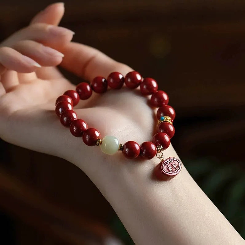 Cinnabar bracelet with emperor sandstone birth year charms in 8mm or 10mm bead sizes