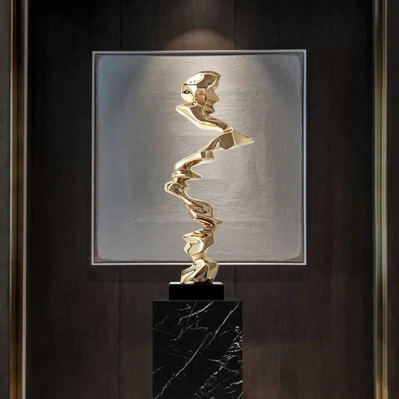 Modern abstract still life sculpture ornament in bright gold, elegant silver, or phantom blue.