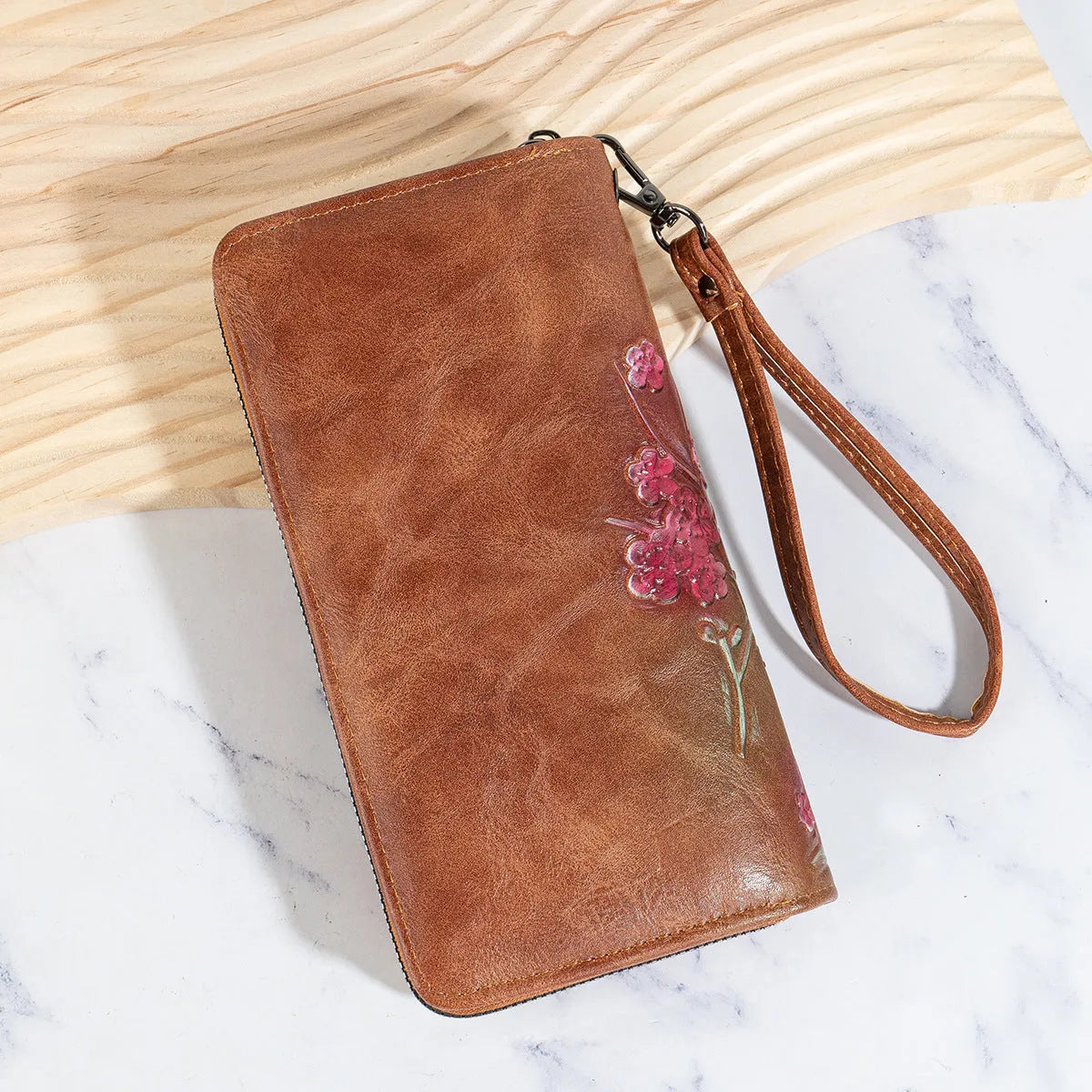 Chinese style floral embossed PU leather zipper handbag in black, brown, and coffee colours.