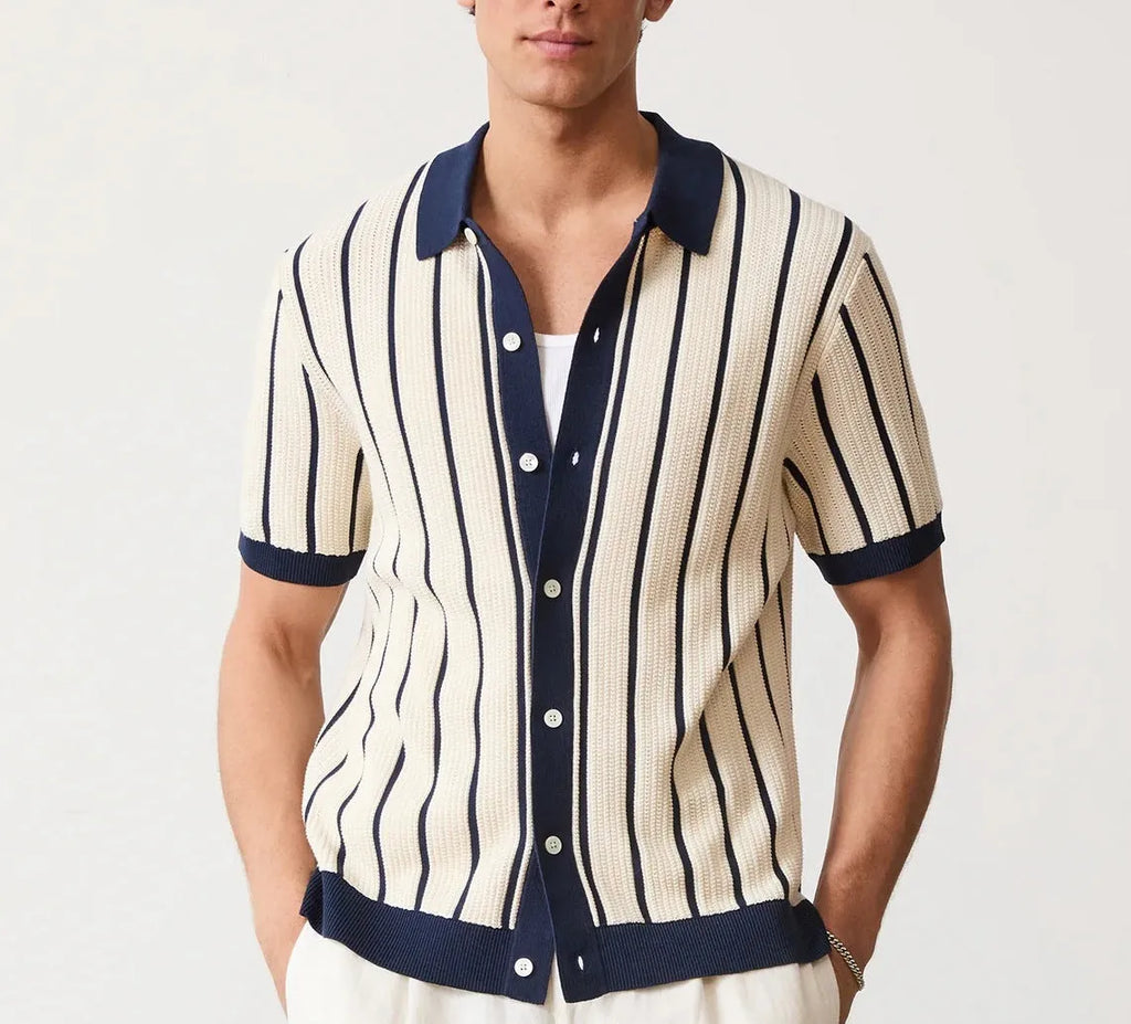 Men's white asymmetric short sleeve knitted top with a lapel, shown on a model.