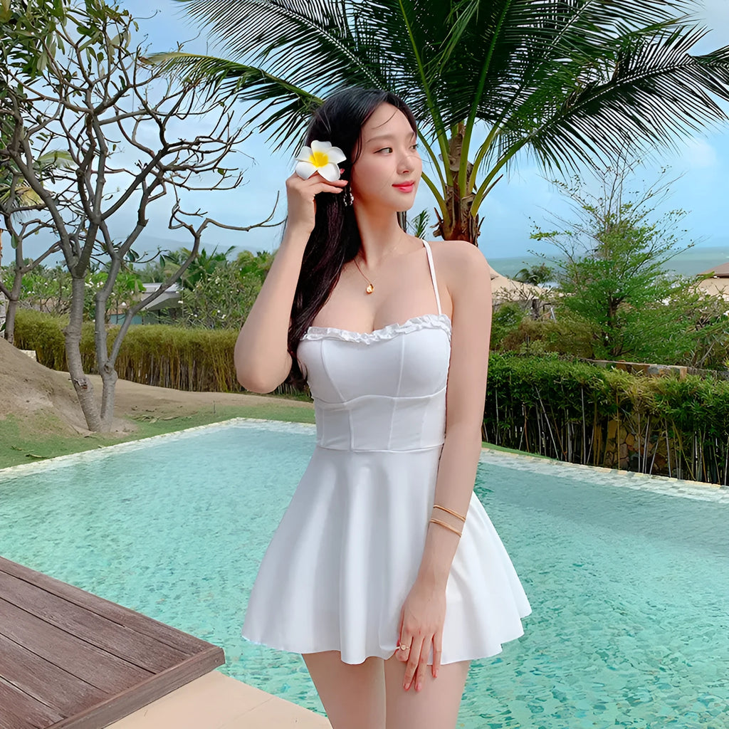 Women's nylon hollow out one-piece swimsuit in white, front view, available in M L XL