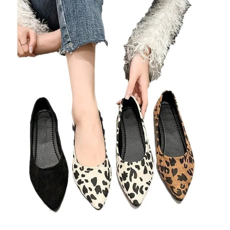 Women's flat pointed toe pumps in leopard print with low heel and cotton upper