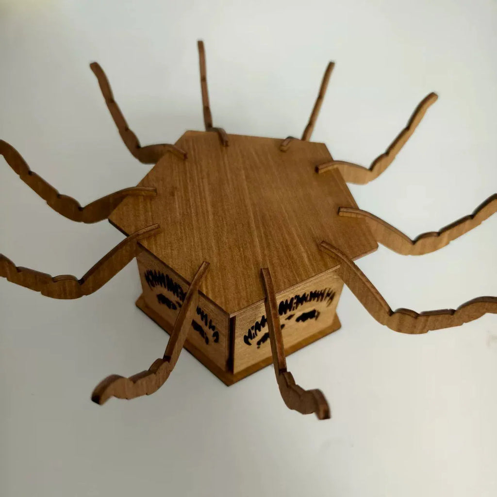 Wooden Halloween spider-themed mini lantern candlestick decoration measuring 21cm by 8.5cm.