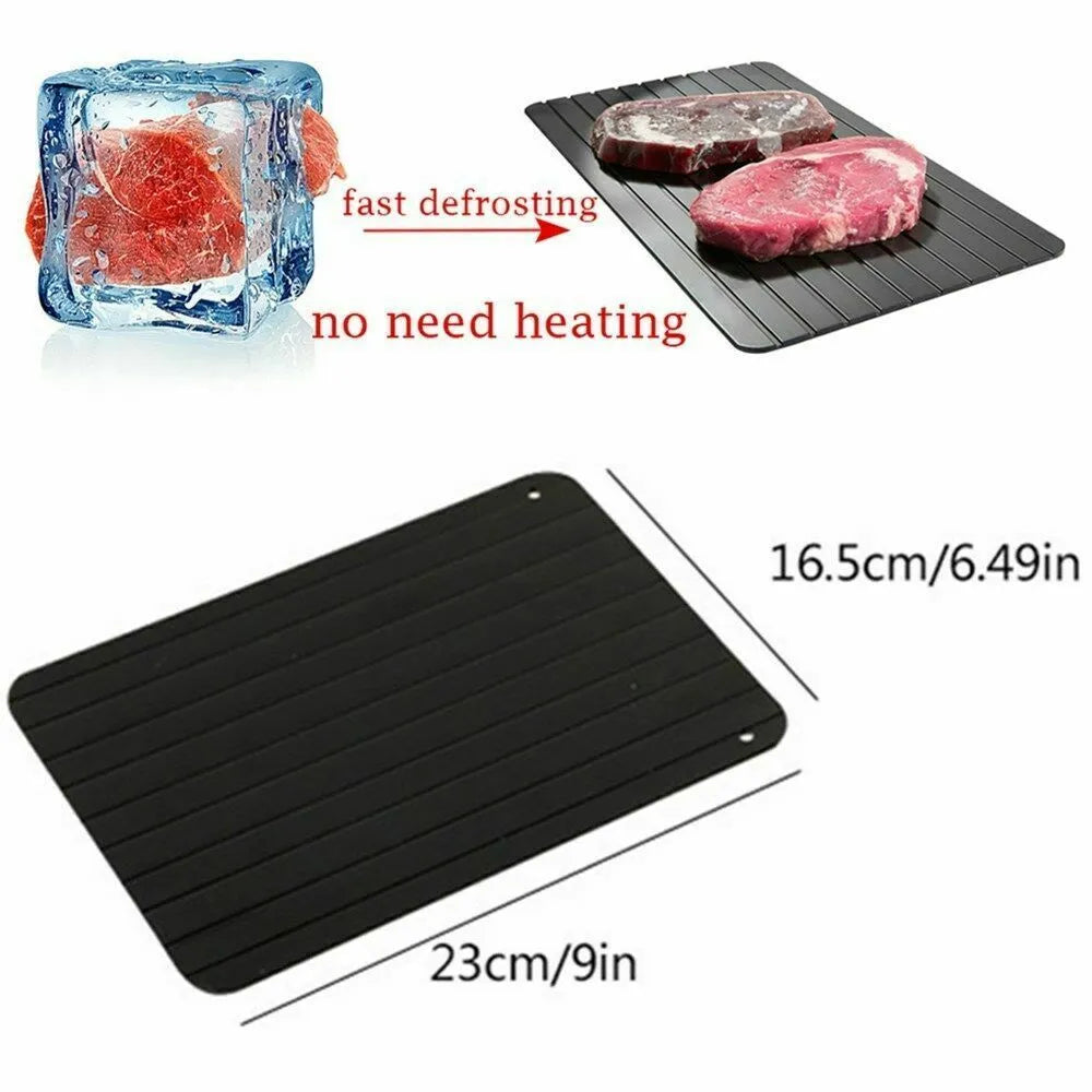 Black aluminium fast defrost tray 23x16.5cm on a countertop
