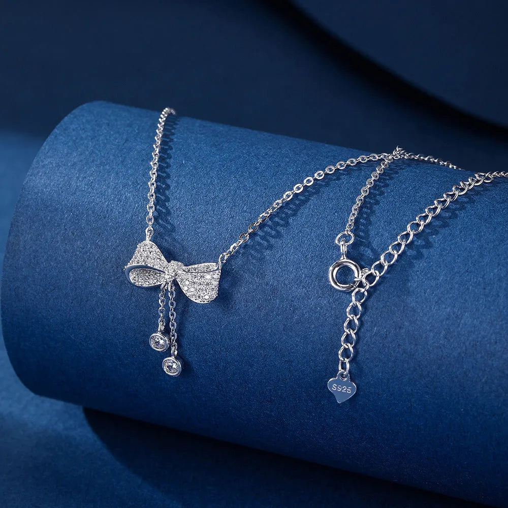 Women's sterling silver bow pendant necklace with O-ring chain, 40-45cm adjustable length