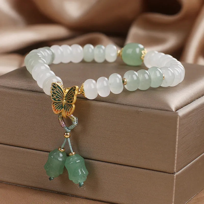 Green crystal Tian Shan Cui abacus beads jade bracelet with retro butterfly tassel and pearl decoration