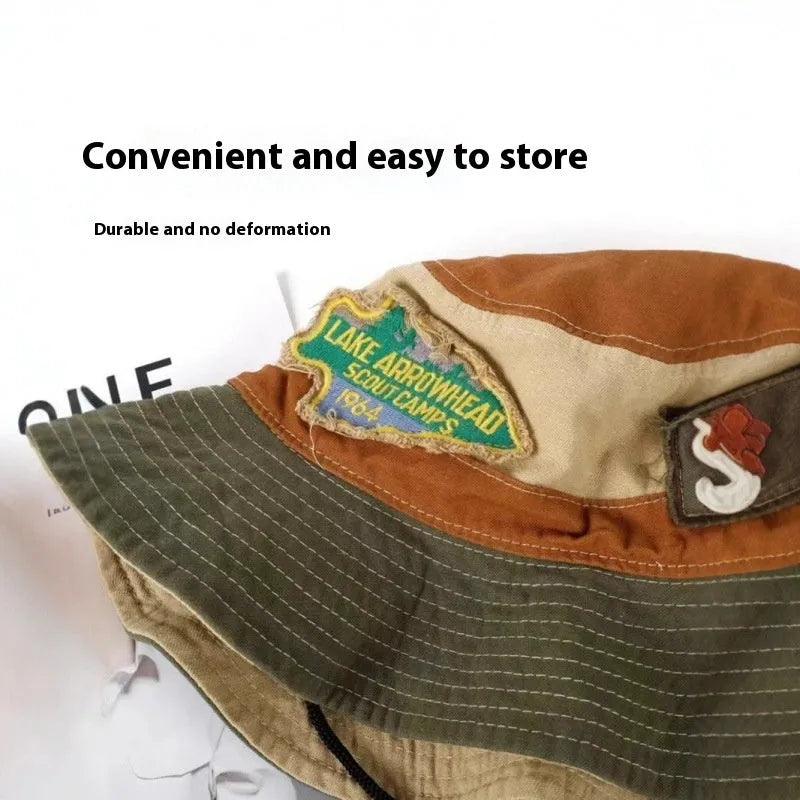 Army green cotton fisherman hat with retro patchwork design and flat top crown