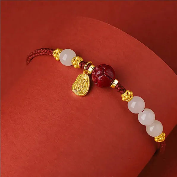 Women's Hetian jade cinnabar red rope bracelet with 925 silver charm and adjustable chain