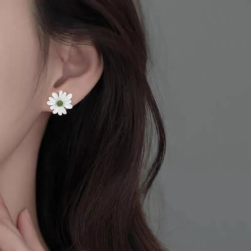 Alloy flower stud earrings in three two-tone colour combinations: white and green, yellow and white, blue and orange