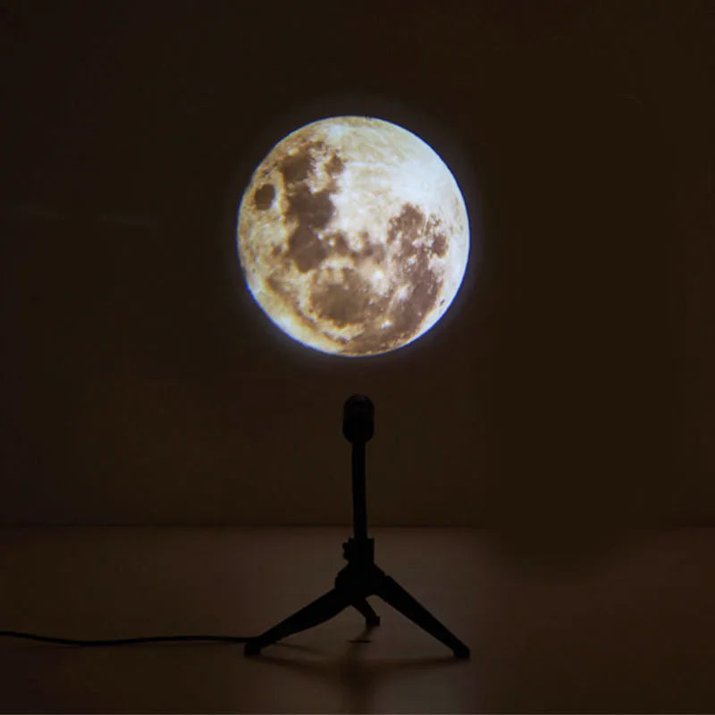 A 2 in 1 earth and moon projection lamp with a flexible hose bracket on a table