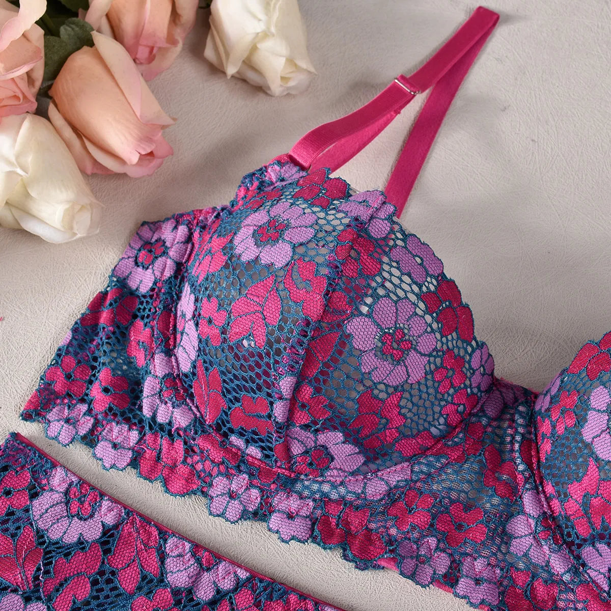 Women's contrast colour embroidered bikini set in rose red, polyester fabric, shown flat lay