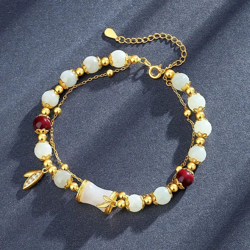 Bamboo special-design glass bracelet in beige with flower shape and Ruyi element, electroplated finish