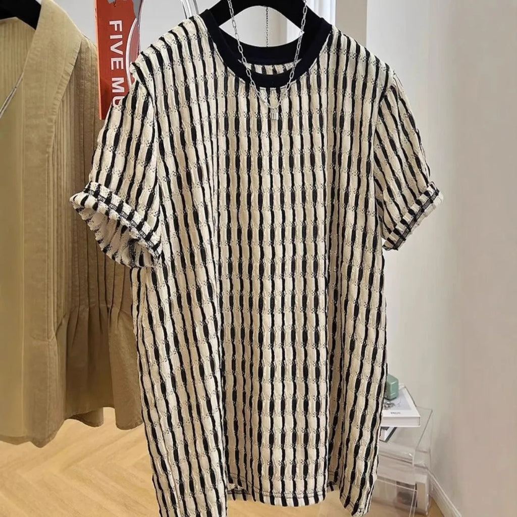 Black striped men's casual loose-fit short sleeve shirt made from a linen and silk blend fabric.