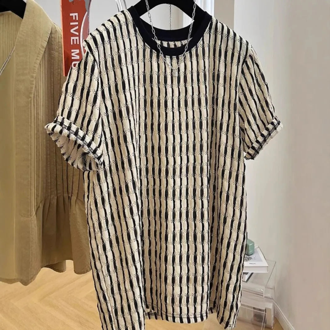 Black striped men's casual loose-fit short sleeve shirt made from a linen and silk blend fabric.