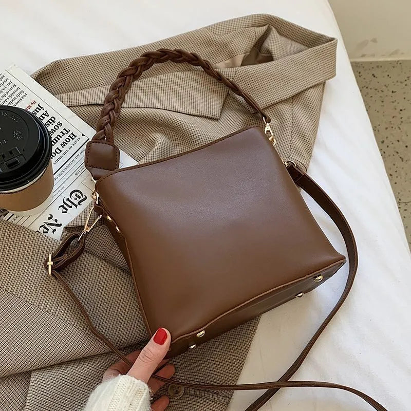 Retro woven PU crossbody bucket bag in khaki colour with adjustable shoulder strap