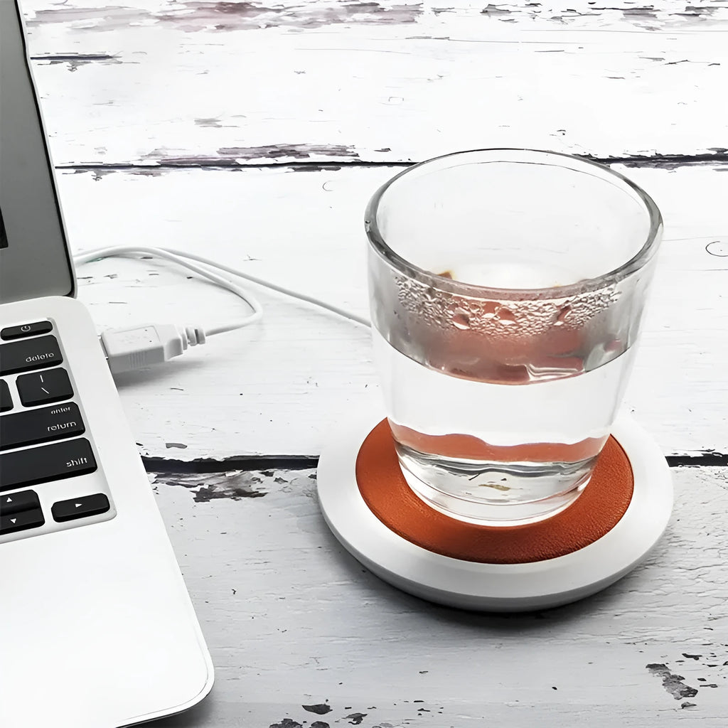 Black USB-powered insulated heating coaster with PU artificial leather surface for desk use