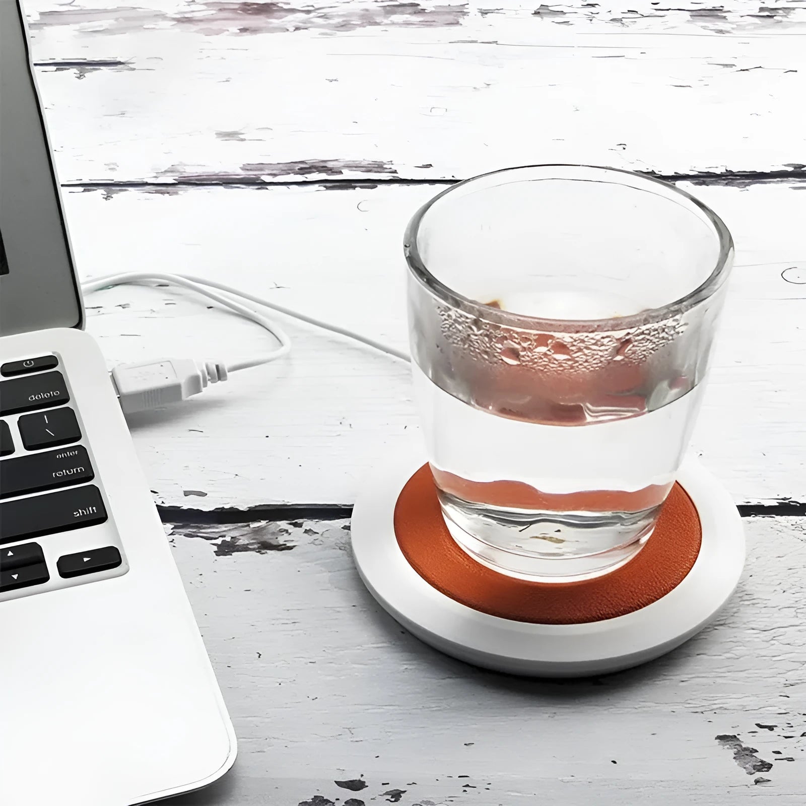 Black USB-powered insulated heating coaster with PU artificial leather surface for desk use