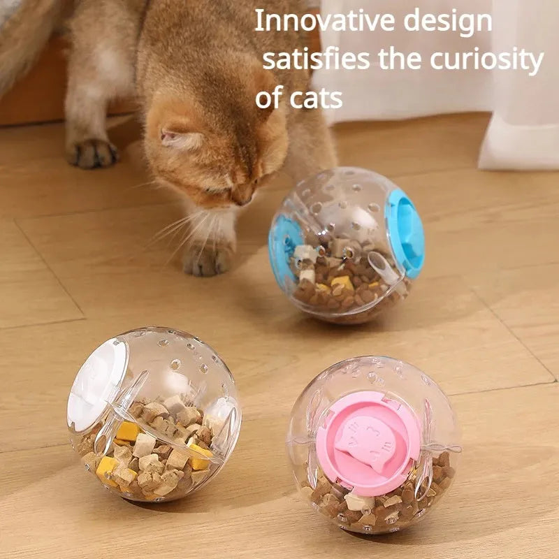 Blue slow feeding ball for cats and small dogs, 11.5cm ABS treat dispenser on floor