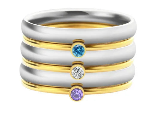 A geometric engraved titanium steel ring featuring a December birthstone in a superimposed design.