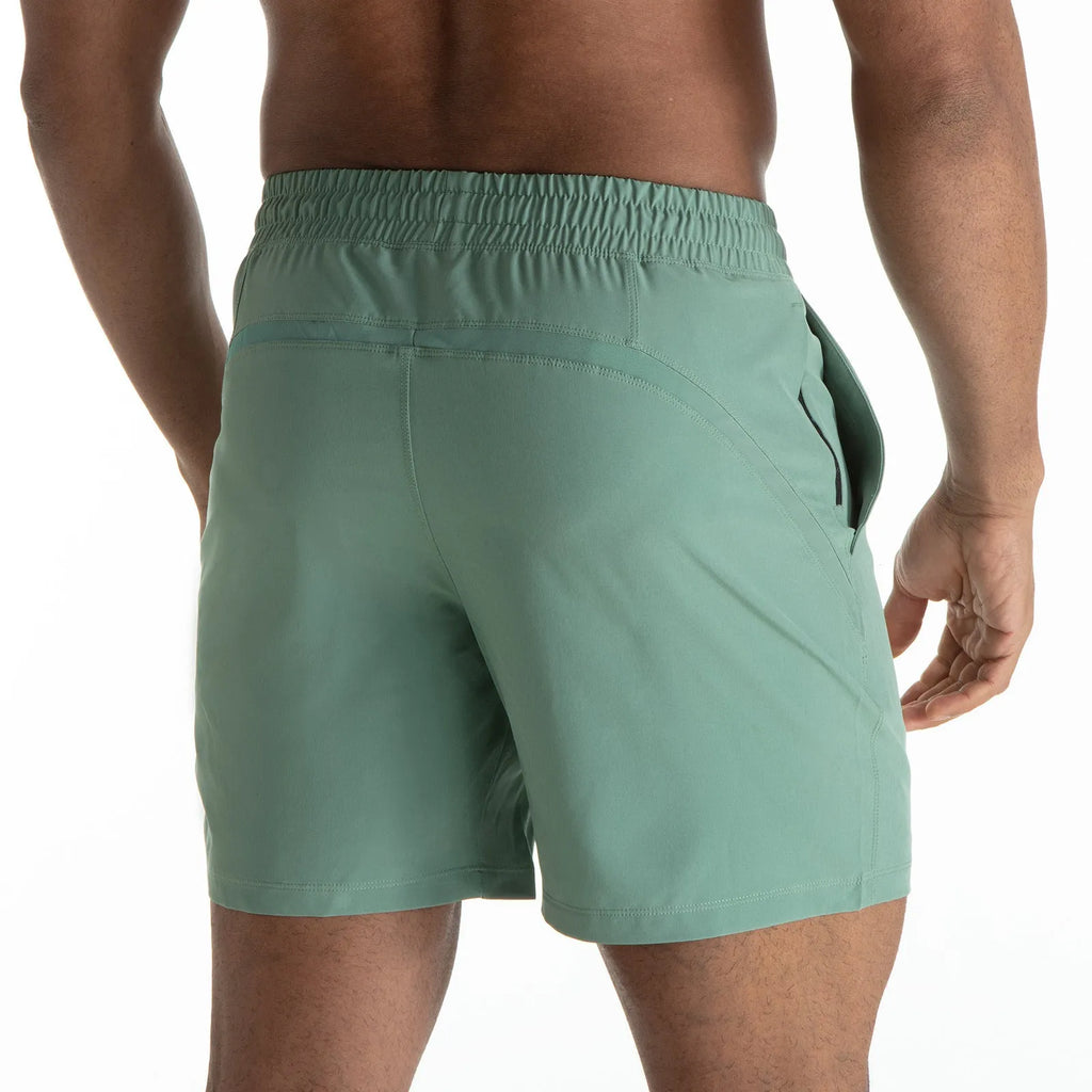 Men's quick-drying mesh stitching casual shorts in black for running and basketball with polyester fabric