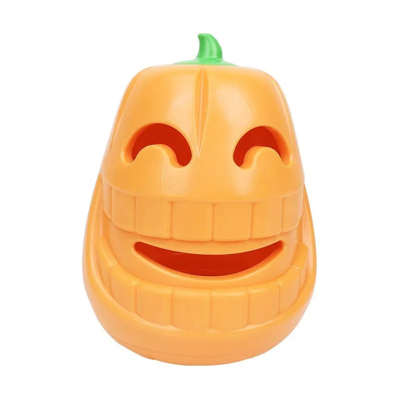 Orange Halloween pumpkin-shaped dog chew toy with a treat-dispensing funnel opening.