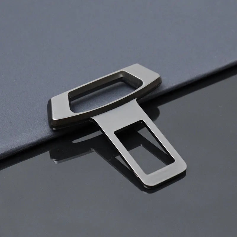 Metal car dashboard silencer insert shown in matte black, gold and silver colour options.