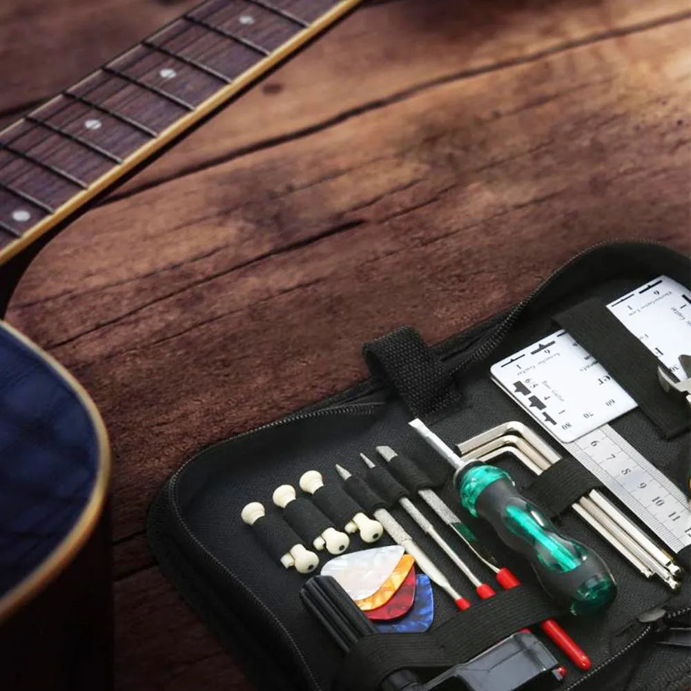 Black guitar repair tool kit for guitars, basses, mandolins and banjos in compact case