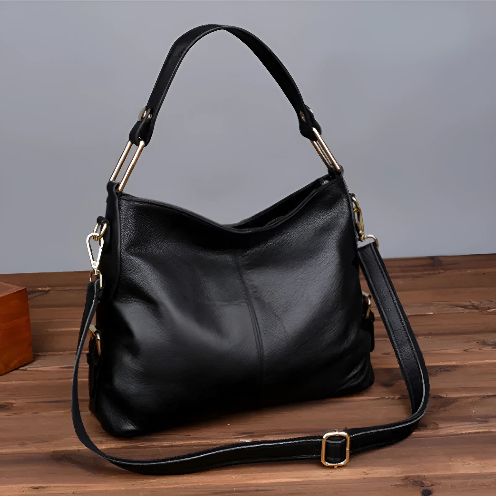 Genuine leather crossbody bag in vertical square shape with internal organisers and crossbody strap