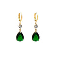Green geometric teardrop alloy earrings with post findings on plain background