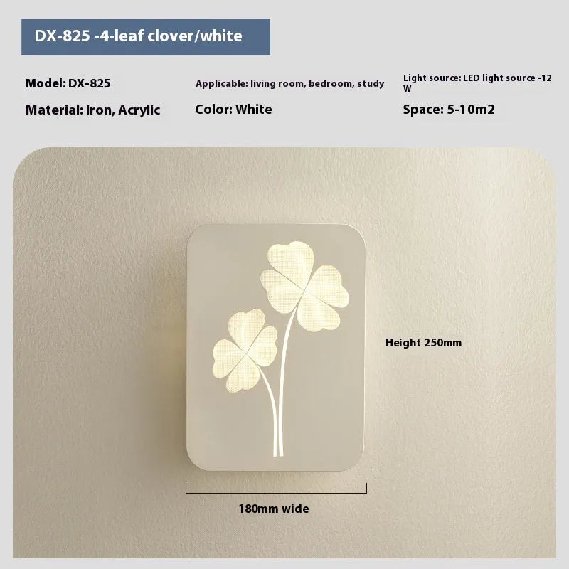 Modern wall lamp with decorative acrylic shade showing love heart design in pink colour option