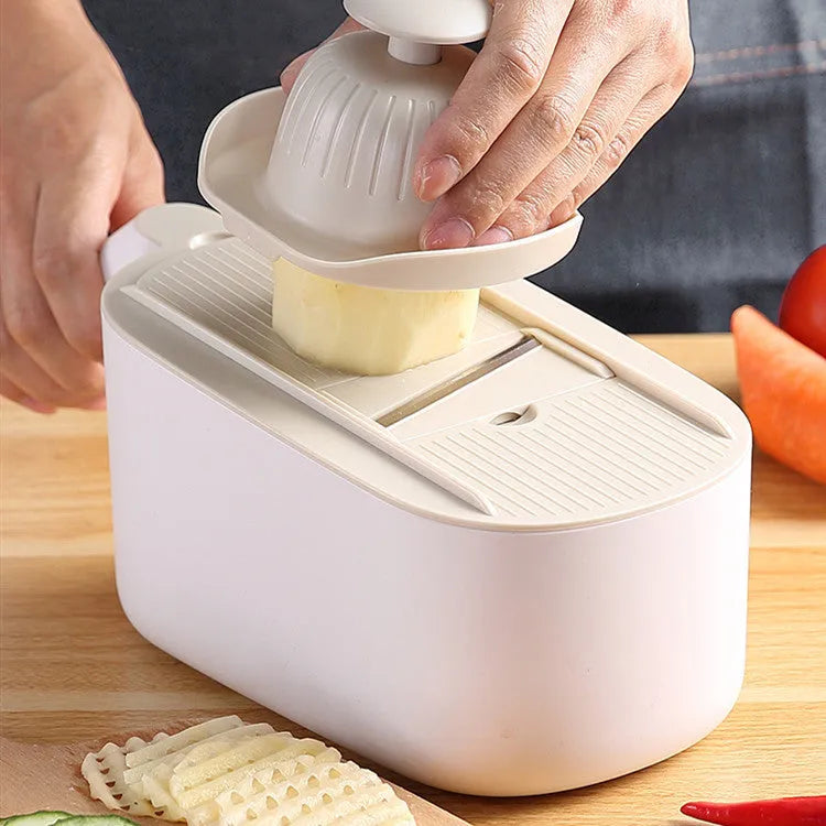 Multifunctional vegetable cutter with stainless steel blades in Nordic style, available in Blue, Grey, and Khaki colours