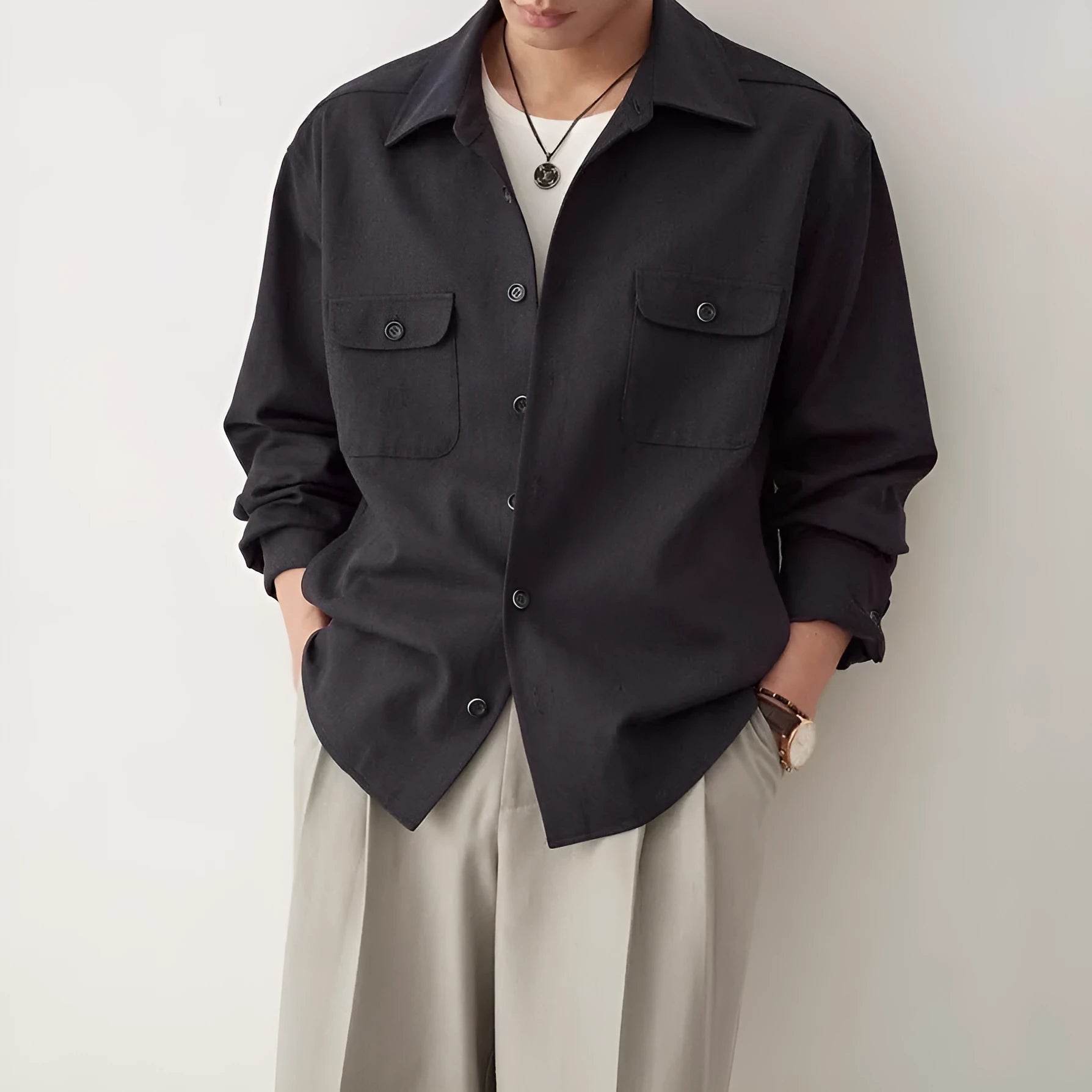 Men's cotton blend lapel shirt in light sand rice colour showing simple collar design and long sleeves