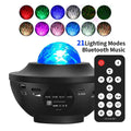 Black desktop starry sky projection lamp with rotating water ripple laser effects and remote control.