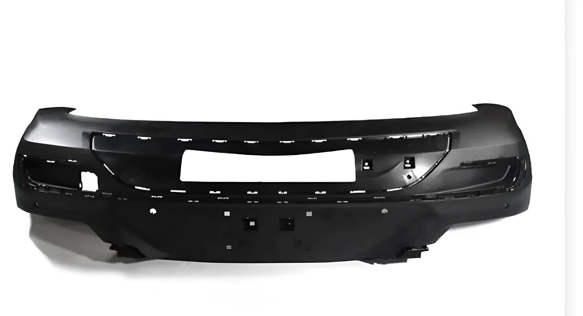 Black plastic car bumper guard on a vehicle front for scratch protection