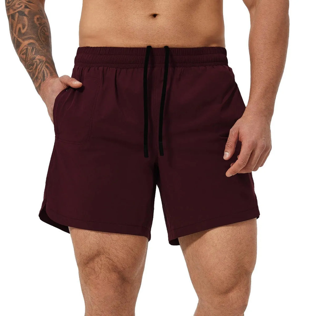 Men's moisture-wicking nylon running basketball tennis shorts in black, mid waist design