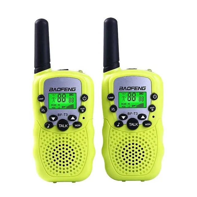 Child walkie talkie set showing two handheld radios in different colours on a green background.