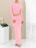 Women's slim fit autumn two-piece suit set in a sweet style with a long skirt and exposed navel top.